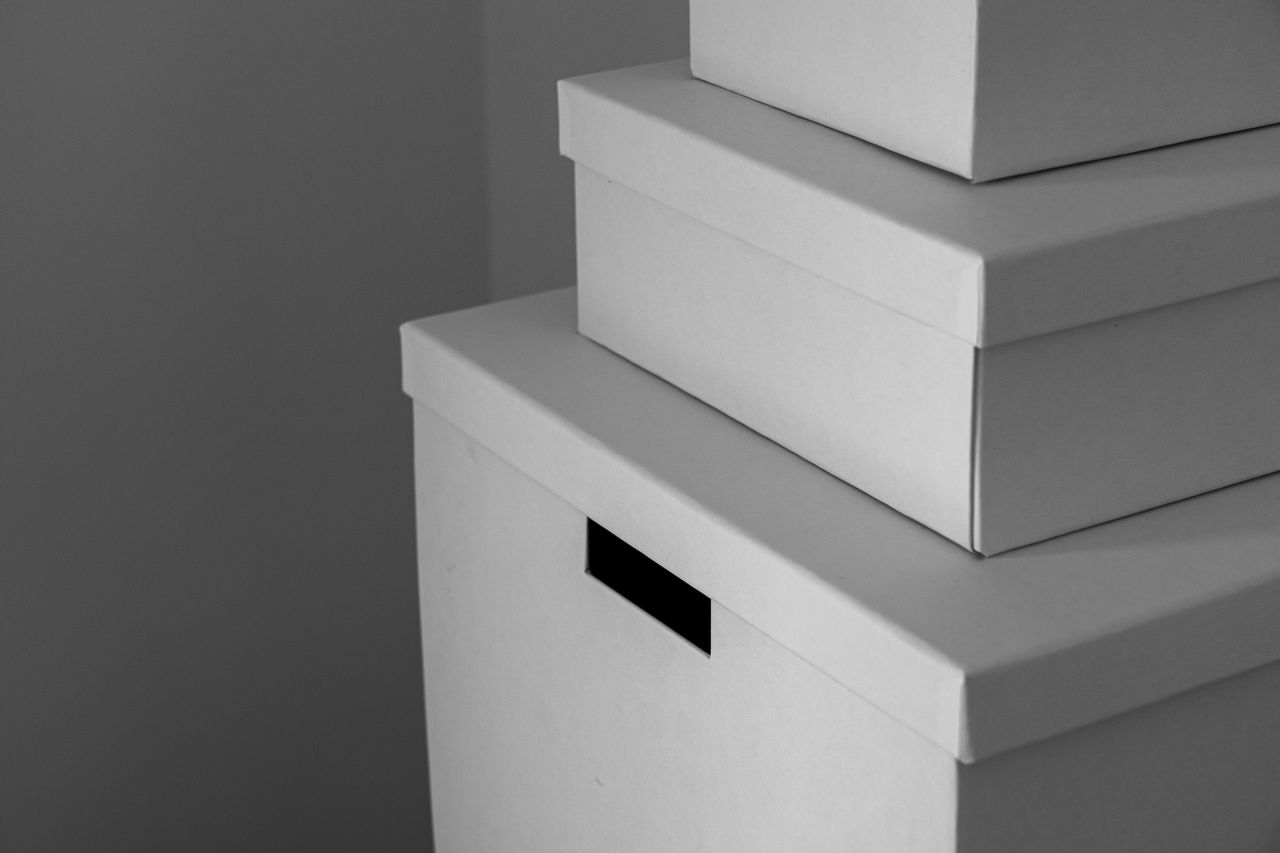 White storage boxes with simple pull handles